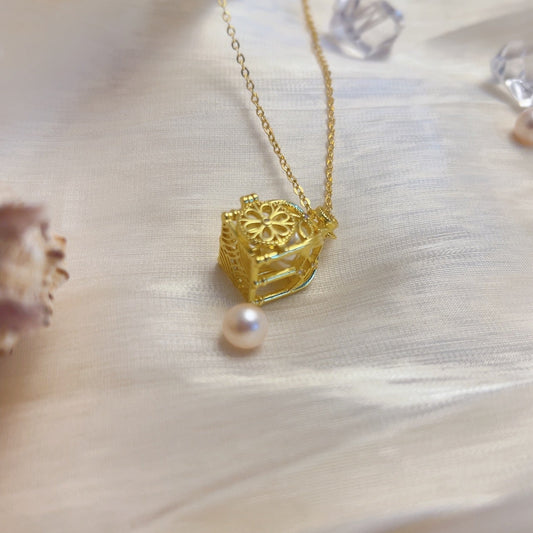 A delicate little cage open necklace